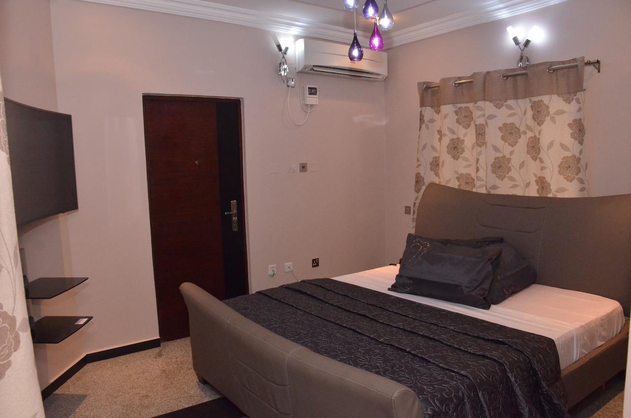 Platinum Inn Gee Hotel Suru Lere Bagian luar foto